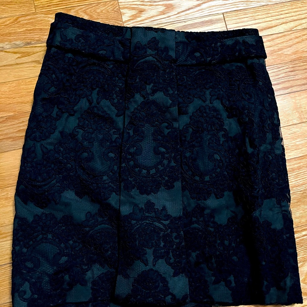 Robert Rodriguez short skirt. Dark green with black lace overlay. Size 2.